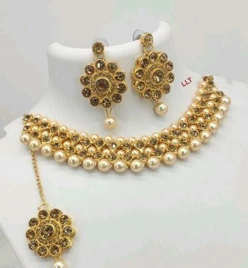 Checkout this latest Jewellery Set
Product Name: *Shining Diva Gold Plated Traditional Jewellery Necklace Set with Earrings For Women*
Base Metal: Alloy
Plating: Gold Plated
Stone Type: Cubic Zirconia/American Diamond
Sizing: Adjustable
Type: Necklace Earrings Maangtika
Net Quantity (N): 1
Shining Diva is a well known brand across fashion jewellery sector. Shining Diva products are preferred by many Designers, Stars and Celebrities. Shining Diva fashion jewelry believes in making beauty and fashion a part of everybody's life. Complete your beautiful looks with this necklace set and get an overall gorgeous appearance. Wear it on special occasions and everyone with your looks. This necklace set is a perfect combination of traditional & contemporary design. Suitable for all Kinds of Dressy Occasions. Jewelry adds Lavishing look to any clothing. Any fabulous outfit is incomplete without matching jewelry. A woman is completely dressed with wearing matching jewelry. 
Country of Origin: India
Easy Returns Available In Case Of Any Issue


SKU: Q4yny2mn
Supplier Name: Faith avenue

Code: 001-102887040-081

Catalog Name: Allure Elegant Jewellery Sets
CatalogID_29669506
M05-C11-SC1093