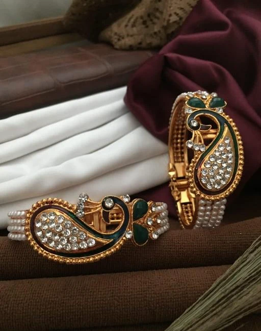 Checkout this latest Bracelet & Bangles
Product Name: *Diva Graceful Bracelet & Bangles*
Base Metal: Alloy
Plating: Gold Plated
Stone Type: Pearls
Sizing: Adjustable
Type: Cuff
Sizes:Free Size
Country of Origin: India
Easy Returns Available In Case Of Any Issue


SKU: BR-1811
Supplier Name: HARIKRUSHNA ENTERPRISE

Code: 581-103003637-994

Catalog Name: Diva Graceful Bracelet & Bangles
CatalogID_29706559
M05-C11-SC1094