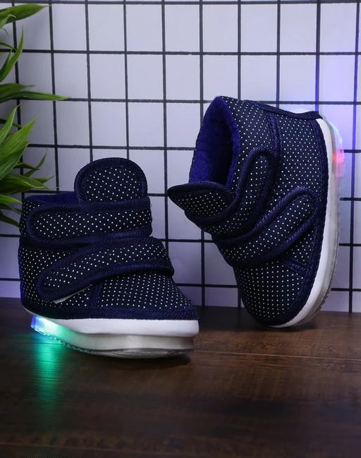 Checkout this latest Casual Shoes
Product Name: *Chiu Kids LED Light Shoes With Musical Chu Chu Sound For Baby Girl And Baby Boys*
Material: Canvas
Sole Material: PVC
Pattern: Solid
Fastening & Back Detail: Velcro
Net Quantity (N): 1
Sizes: 
12-15 Months (Foot Length Size: 13 in) 
15-18 Months, 18-21 Months, 21-24 Months
Country of Origin: India
Easy Returns Available In Case Of Any Issue


SKU: C02_LED_Dot_NavyBlue_5
Supplier Name: CHIU-

Code: 953-10933801-996

Catalog Name: Attractive Trendy Kids Girls & Boys Casual Shoes
CatalogID_2022385
M09-C31-SC1164
.
