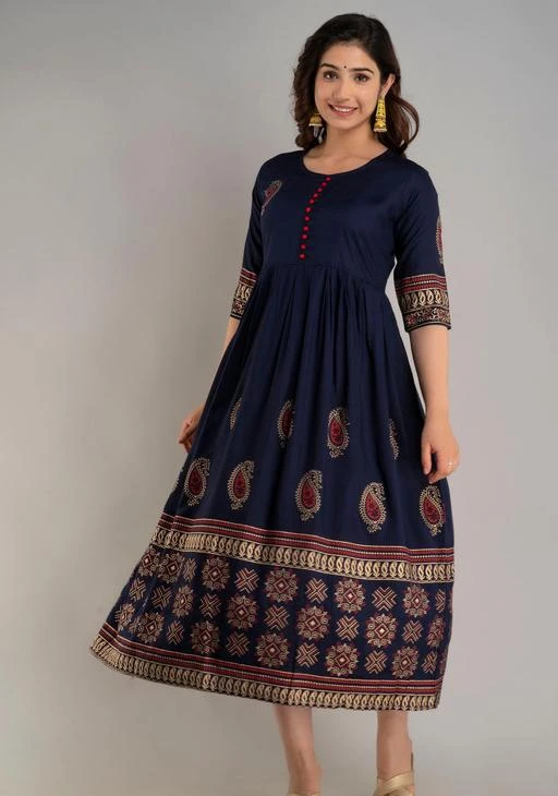 Checkout this latest Kurtis
Product Name: *Aagam Voguish Kurtis*
Fabric: Rayon
Sleeve Length: Three-Quarter Sleeves
Pattern: Printed
Combo of: Single
Sizes:
M (Bust Size: 38 in, Size Length: 48 in) 
L (Bust Size: 40 in, Size Length: 48 in) 
XL (Bust Size: 42 in, Size Length: 48 in) 
XXL (Bust Size: 44 in, Size Length: 48 in) 
women's rayon printed anarkali kurta has a, round neck, 3/4 sleeves, flared hem, long length and buttons embellishment at yoke. Sales package includes: 1 kurta, It is our new design from our latest collection, designer and trendy maxi-kurta for girls and women's, it can be wear on any occasion and party. 
Country of Origin: India
Easy Returns Available In Case Of Any Issue


SKU: RSG_Anarkali Kurta_1005
Supplier Name: SHRI RIDDHI SIDDHI GARMENTS

Code: 973-109723187-9951

Catalog Name: Aagam Voguish Kurtis
CatalogID_31789053
M03-C03-SC1001