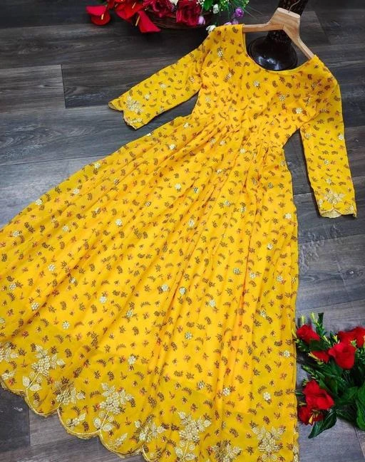 Checkout this latest Dresses
Product Name: *Urbane Fabulous Women Dresses*
Fabric: Georgette
Sleeve Length: Three-Quarter Sleeves
Pattern: Printed
Net Quantity (N): 1
Sizes:
M (Bust Size: 38 in, Length Size: 52 in) 
L (Bust Size: 40 in, Length Size: 52 in) 
XL (Bust Size: 42 in, Length Size: 52 in) 
XXL (Bust Size: 44 in, Length Size: 52 in) 
Absolutely In Love With This Dress?   This Printed Yellow Georgette Dress With Fine Golden Embroidery All Over And Cut Work Border At Bottom And At Sleeve End??  This Fine Detailing Is Something That Add's The Extra Charm ?And So Soothing And Elegant For All The Weddings Coming Your Way Fabric:- FOX GEORGETTE Complete Linning Length - 52 Inches + Sizes M-38 L-40 XL-42 XXL-44
Country of Origin: India
Easy Returns Available In Case Of Any Issue


SKU: Golden-YELLOW-VN-SM-68
Supplier Name: ADIDEV ENTERPRISE

Code: 719-112182324-9961

Catalog Name: Urbane Fabulous Women Dresses
CatalogID_32572114
M04-C07-SC1025