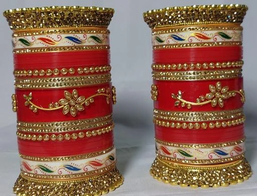 Checkout this latest Bracelet & Bangles
Product Name: *Deevya Exclusive Punjabi Collection Full Bridal Chura for Wedding Ceremony Fabulous Design Build Quality Beautifully Made Chura Bangle Set for Girls Bangles *
Base Metal: Plastic
Plating: No Plating
Stone Type: Cubic Zirconia/American Diamond
Sizing: Non-Adjustable
Type: Chooda
Net Quantity (N): More Than 10
Sizes:2.4, 2.6, 2.8
India's First Online Store Personalized Bangles Set & Bridal Chura Latest Designs. Czech rhinestones Embedded Names of Bride and Bridegroom. Wedding Chura Online in India. First Online Store Personalized Bangles Set & Bridal Chura Latest Design see our collocation.   Be it for their attractive colours, graceful designs, beautiful ornamental appeal, lovely musical tinkle or the traditional value, bridal churas are bride’s love. Brides are flaunting their chura sets containing different designs and styles of bangles.   From traditional red and cream ,maroon, Blood Red ,White churas to golden churas and Hot Pink churas with fancy designs, a bride has lots on her lap. These days the hot trend is to match your bridal chura with your lehenga. So all you brides-to-be out there seeking latest chura trends, here I bring to you the best bridal chura designs collection from which you can take inspiration. Flaunt Your Wedding Chura with These Trendy Designs,Most Beautiful Bridal Chura Designs for Brides
Country of Origin: India
Easy Returns Available In Case Of Any Issue


SKU: Bangle chooda 1002
Supplier Name: DEEVYA ENTERPRISES

Code: 324-115541460-997

Catalog Name: Elite Fusion Bracelet & Bangles
CatalogID_33620782
M05-C11-SC1094