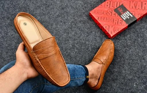 Checkout this latest Loafers
Product Name: *Adaab Summer Coolers Mules Loafer*
Material: Synthetic
Sole Material: Pu
Fastening: Slip On
Toe Shape: Round Toe
Multipack: 1
Syntethic Leather Sole Material: Polyurethane Fastening & Back Detail: Lace-Up Multipack: 1 Sizes: IND-6, IND-7, IND-8, IND-9, IND-10 Elevate Your Style With This Classy Pair Of Shoe For Men And Boys From The House Of Brand. Featuring A Contemporary Refined Sneakers For Men Branded Loafers Shoes For Men Design With Exceptional Comfort, This Loafers For Men Stylish Latest Pair Is Perfect To Give Your Quintessential Dressing An Upgrade. Just Like Casual Shoes For Men? From These Are Top Of The Range Shoes For Men Leather Synthetic. Aim Is To Provide Well Designed Footwear For Men Latest Wear For The People Who Believe They Are Not Just To Cover And Protect The Feet, But Are Important In Making The Personality Of The Wearer. Our Assortments Are Designed To Carry Attributes Such As Lightweight, Comfort, Perfect Fitting, Skin Friendly Cuts And Materials With Mesmerizing Patterns. Black Shoes Sole Are Unique In Mens Casual Shoes From Are A Symbol Of Hard Work And Creative Artist's Impression. Men Shoes Stylish Are Designed To Keeping In Mind Durability As Well As Trends, The Most Fashionable Range Of Brown Shoes For Men. They Are Exclusively Designed To Match The Up Coming Trends Of The New Generation Shoes For Men Formal. This Pair Of Man Shoes New Casual Is Sure To Make You Look Smart & Classy. These Will Go With Most Of Your Casual Outfits. This Product Is Made Of Premium Quality
Sizes: 
IND-6 (Foot Length Size: 25.1 cm) 
IND-7 (Foot Length Size: 25.7 cm) 
IND-8 (Foot Length Size: 26.3 cm) 
IND-9 (Foot Length Size: 26.9 cm) 
IND-10 (Foot Length Size: 27.5 cm) 
Country of Origin: India
Easy Returns Available In Case Of Any Issue


SKU: MSJT-2061
Supplier Name: JHAMNANI TRADELINKS

Code: 674-118831337-9991

Catalog Name: Stylish Men Loafers
CatalogID_34692273
M09-C29-SC1470