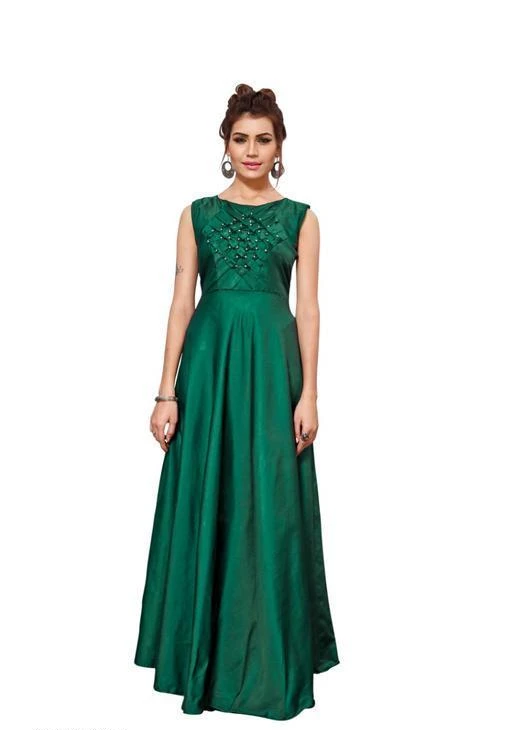 Gowns
Women's Self-Design Green Silk Dress
Fabric:  Taffeta Silk
Sleeves: Short Sleeves Are Attached Inside
Size : L - 40 in XL - 42 in  XXL - 44 in
Length: Up To 57 in
Type: Stitched
Description: It Has 1 Piece Of Women's  Gowns & Half Inner Attached
Work: Beads Work
Country of Origin: India
Sizes Available: L, XL, XXL


Catalog Rating: ★4.3 (304)

Catalog Name: Vedika Stylish Tapeta Silk Women's Gowns Vol 1
CatalogID_155376
C79-SC1289
Code: 853-1232306-