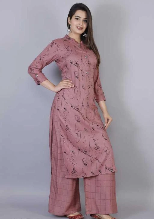 Checkout this latest Kurta Sets
Product Name: *Women Rayon Straight Solid Long Kurti With Palazzos*
Kurta Fabric: Rayon
Bottomwear Fabric: Rayon
Fabric: Rayon
Sleeve Length: Three-Quarter Sleeves
Set Type: Kurta With Bottomwear
Bottom Type: Palazzos
Pattern: Solid
Multipack: Single
Sizes:
M (Bust Size: 38 in, Shoulder Size: 14.5 in, Kurta Waist Size: 36 in, Kurta Hip Size: 40 in, Kurta Length Size: 46 in, Bottom Waist Size: 28 in, Bottom Hip Size: 40 in, Bottom Length Size: 40 in) 
L (Bust Size: 40 in, Shoulder Size: 15 in, Kurta Waist Size: 38 in, Kurta Hip Size: 42 in, Kurta Length Size: 46 in, Bottom Waist Size: 30 in, Bottom Hip Size: 42 in, Bottom Length Size: 40 in) 
XL (Bust Size: 42 in, Shoulder Size: 15.5 in, Kurta Waist Size: 40 in, Kurta Hip Size: 44 in, Kurta Length Size: 46 in, Bottom Waist Size: 32 in, Bottom Hip Size: 44 in, Bottom Length Size: 40 in) 
XXL (Bust Size: 44 in, Shoulder Size: 16 in, Kurta Waist Size: 42 in, Kurta Hip Size: 46 in, Kurta Length Size: 46 in, Bottom Waist Size: 34 in, Bottom Hip Size: 46 in, Bottom Length Size: 40 in) 
Country of Origin: India
Easy Returns Available In Case Of Any Issue


Catalog Rating: ★4.4 (73)

Catalog Name: Women Rayon A-line Printed Long Kurti With Palazzos
CatalogID_2402293
C74-SC1003
Code: 345-12470909-9651