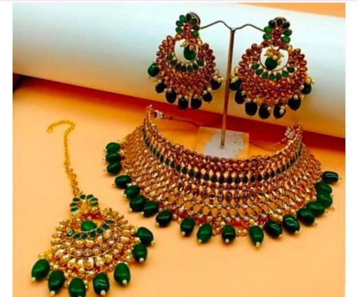 Checkout this latest Jewellery Set
Product Name: *New Gold Plated Jewellery set for women's & Girl*
Base Metal: Alloy
Plating: Gold Plated
Stone Type: Kundan
Sizing: Adjustable
Type: Necklace Earrings Maangtika
Net Quantity (N): 1
Quality: Gold plated pearl necklace jewelry set studded with crystal and cubic zirconia diamonds. Beauty: This pearl necklace jewelry set will complement any traditional or modern attire. The color complements all outfits and may be worn as a statement piece for any occasion. Once you wear this jewelry set, you will look no less than a diva. Ideal necklace jewelry set for the party and festive wear. Skin-friendly: Nickel-free and lead-free as per international standards. Anti-allergic and safe for skin. Brand - Shining diva is a well-known brand across the fashion jewelry sector. Shining diva products are preferred by many designers, stars, and celebrities. Shining diva fashion jewelry believes in making beauty and fashion a part of everybody's life. This product is a true value for money. 
Country of Origin: India
Easy Returns Available In Case Of Any Issue


SKU: Potr1pI9
Supplier Name: Faith avenue

Code: 213-140347800-994

Catalog Name: Twinkling Fancy Jewellery Sets
CatalogID_41640189
M05-C11-SC1093