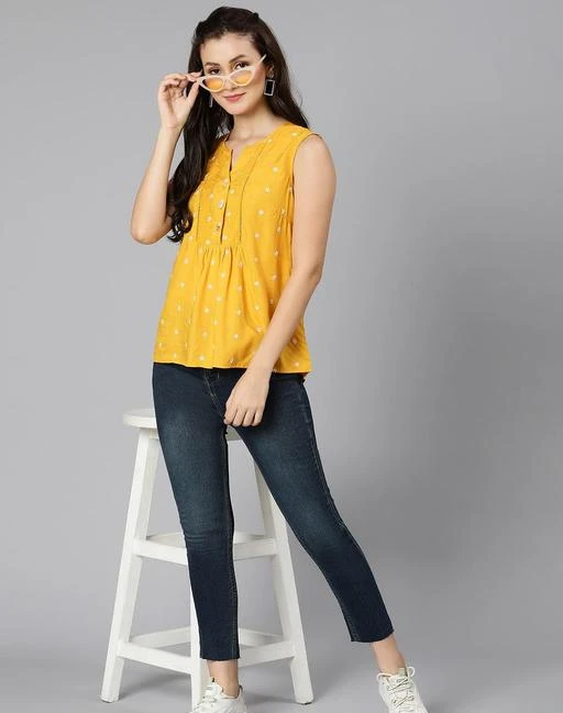 Checkout this latest Tops & Tunics
Product Name: *Trendy Fabulous Women Tops & Tunics*
Fabric: Cotton
Sleeve Length: Sleeveless
Pattern: Solid
Net Quantity (N): 1
Sizes:
S (Bust Size: 36 in, Length Size: 25 in) 
M (Bust Size: 38 in, Length Size: 25 in) 
L (Bust Size: 40 in, Length Size: 26 in) 
XL (Bust Size: 42 in, Length Size: 26 in) 
Aesthetic and classy this Dobby fabric rusted orange color laced up women's top is pretty personified all over as it features an all floral dobby work, keyhole neck, and lace in the front to peak up the look and length to the waist with a round hem. Charmful and smart this top is good to wear in the office, on lunch outings, or any casual affair. Pair it with white or black pants & palazzo to get an entire look
Country of Origin: India
Easy Returns Available In Case Of Any Issue


SKU: 1839276202
Supplier Name: KPA Apparels Pvt Ltd

Code: 1721-146174874-9991

Catalog Name: Trendy Fabulous Women Tops & Tunics
CatalogID_43672543
M04-C07-SC1020