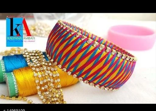 Bangles & Bracelets
Feminine Chic Bracelet & Bangles
Base Metal: Thread
Plating: No Plating
Stone Type: Artificial Stones & Beads
Sizing: Non-Adjustable
Sizes:
Country of Origin: India
Sizes Available: 

SKU: LpWZP9wo
Supplier Name: ANAN TRADERS

Code: 022-14969109-066

Catalog Name: Princess Chic Bracelet & Bangles
CatalogID_2979222
M05-C11-SC1094