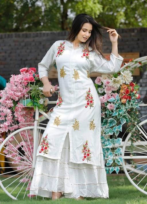 Checkout this latest Kurta Sets
Product Name: *Women's Straight Calf Length Floral Embroidered Kurta Sharara Set*
Kurta Fabric: Rayon
Bottomwear Fabric: Rayon
Fabric: No Dupatta
Sleeve Length: Three-Quarter Sleeves
Set Type: Kurta With Bottomwear
Bottom Type: Sharara
Pattern: Embroidered
Multipack: Single
Sizes:
M (Bust Size: 38 in, Shoulder Size: 18 in, Kurta Waist Size: 32 in, Kurta Hip Size: 40 in, Kurta Length Size: 45 in, Bottom Waist Size: 32 in, Bottom Hip Size: 40 in, Bottom Length Size: 45 in) 
L
Country of Origin: India
Easy Returns Available In Case Of Any Issue


Catalog Rating: ★4 (81)

Catalog Name: Trendy Fashionable Women Kurta Sets
CatalogID_3291686
C74-SC1853
Code: 716-16497938-5751