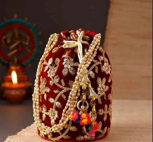 Bridal Velvet Embroidered Potli bags with pearl embellishments and