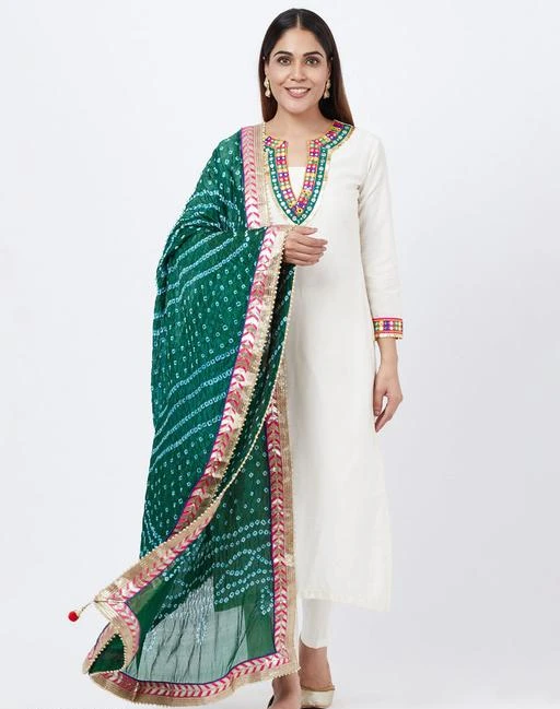 white suit with green dupatta