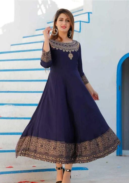 Checkout this latest Kurtis
Product Name: *Women Printed Rayon Flared Kurta*
Fabric: Rayon
Sleeve Length: Three-Quarter Sleeves
Pattern: Printed
Combo of: Single
Sizes:
L, XL (Bust Size: 42 in, Size Length: 50 in) 
XXL
Country of Origin: India
Easy Returns Available In Case Of Any Issue


SKU: FUNDA_BLUE-XL
Supplier Name: Shree Varsha Ethnic Center

Code: 943-17215021-0801

Catalog Name: Women Rayon Flared Gold Printed Kurtis
CatalogID_3460948
M03-C03-SC1001