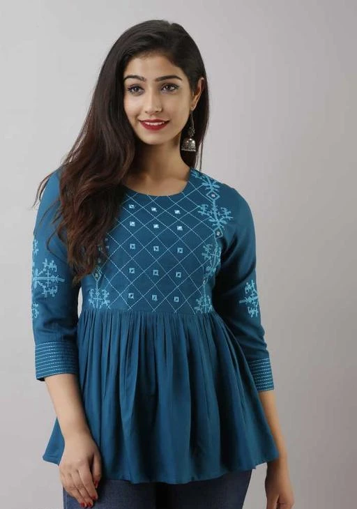 Checkout this latest Tops & Tunics
Product Name: *Classy Glamorius Women Tops & Tunics*
Fabric: Rayon
Sleeve Length: Three-Quarter Sleeves
Pattern: Embroidered
Multipack: 1
Sizes:
XXL (Bust Size: 44 in, Length Size: 28 in) 
Country of Origin: India
Easy Returns Available In Case Of Any Issue


Catalog Rating: ★4 (144)

Catalog Name: Classy Ravishing Women Tops & Tunics
CatalogID_4285335
C79-SC1020
Code: 623-20521993-0711