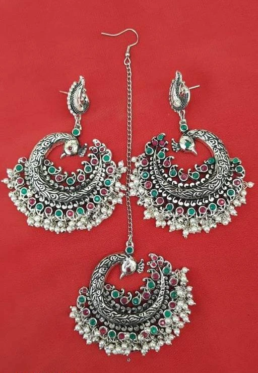 Checkout this latest Maangtika
Product Name: *German Silver oxidised plating peacock maangtikka with earring for women & girls - pink green color*
Base Metal: German Silver
Plating: Oxidised Silver
Stone Type: Artificial Stones & Beads
Type: Chaand Tika
Multipack: 2
Sizes: Free Size
Country of Origin: India
Easy Returns Available In Case Of Any Issue


Catalog Rating: ★4 (81)

Catalog Name: Sizzling Chunky Maangtika
CatalogID_4329714
C77-SC1100
Code: 372-20689599-738