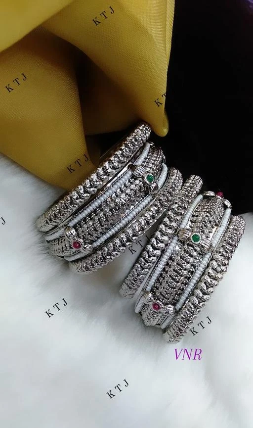 Checkout this latest Bracelet & Bangles
Product Name: *Feminine Beautiful Bracelet & Bangles*
Base Metal: Alloy
Plating: Oxidised Silver
Stone Type: Artificial Stones
Sizing: Non-Adjustable
Type: Bangle Set
Net Quantity (N): 6
Sizes:2.4, 2.6, 2.8
Country of Origin: India
Easy Returns Available In Case Of Any Issue


SKU: b119
Supplier Name: KAMAL ART

Code: 803-21189270-639

Catalog Name: Feminine Beautiful Bracelet & Bangles
CatalogID_4461091
M05-C11-SC1094