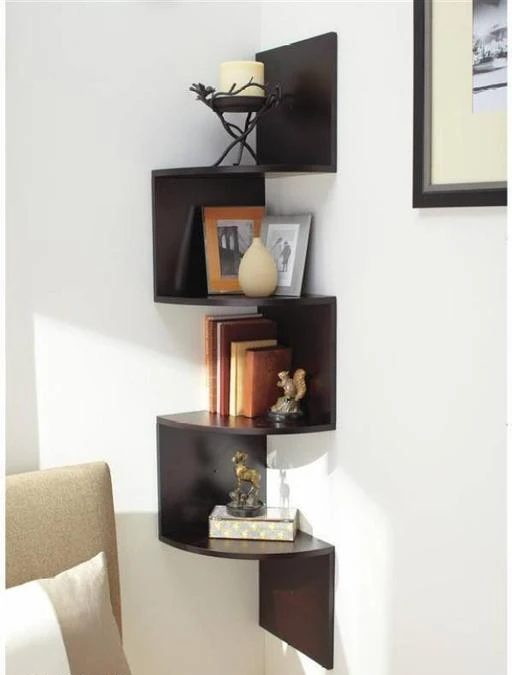 Checkout this latest Wall Shelves_1000-1500
Product Name: *Classy Magazine & Newspaper Racks*
Material: Wooden
Pack: Pack of 1
Product Length: 8 Inch
Product Breadth: 8 Inch
Product Height: 40 Inch
No. of Shelves: 4
 This martemporium Shaped Wall Mount Corner Wall Shelf is a complete utility product that will make a great addition to your elegantly set house. If you are looking for a simple yet elegant shelf, then look no further than this Designer Wall Shelf from martemporium. Sporting a trendy finish, it can be used to place your decorative objects like showpieces, flower vase, and such
Country of Origin: India
Easy Returns Available In Case Of Any Issue


SKU: mob blk 9
Supplier Name: BLACK TREE ENTERPRISES

Code: 993-22282510-997

Catalog Name: Unique Magazine & Newspaper Racks
CatalogID_4766241
M08-C25-SC1622