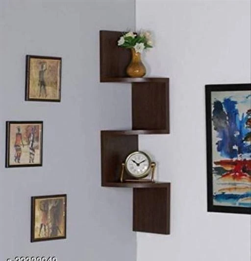Checkout this latest Wall Shelves
Product Name: *Essential Magazine & Newspaper Racks*
Material: Wooden
Net Quantity (N): Pack of 1
Product Length: 8 Inch
Product Breadth: 8 Inch
Product Height: 32 Inch
No. of Shelves: 3
This martemporium Shaped Wall Mount Corner Wall Shelf is a complete utility product that will make a great addition to your elegantly set house. If you are looking for a simple yet elegant shelf, then look no further than this Designer Wall Shelf from martemporium. Sporting a trendy finish, it can be used to place your decorative objects like showpieces, flower vase, and such
Country of Origin: India
Easy Returns Available In Case Of Any Issue


SKU: ad-brown 7
Supplier Name: Wall street Enterprises

Code: 283-22388949-996

Catalog Name: Attractive Magazine & Newspaper Racks
CatalogID_4790142
M08-C25-SC1622