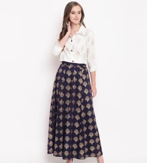 Checkout this latest Ethnic Skirt and Top
Product Name: *Trendy Partywear Women Ethnic Skirts and Tops*
Top Fabric: Cotton Blend
Bottom Fabric: Rayon
Sleeve Length: Long Sleeves
Bottom Pattern: Printed
Net Quantity (N): 2
Sizes: 
S (Top Bust Size: 36 in, Top Length Size: 26 in, Bottom Waist Size: 26 in, Bottom Length Size: 40 in) 
M (Top Bust Size: 38 in, Top Length Size: 26 in, Bottom Waist Size: 28 in, Bottom Length Size: 40 in) 
L (Top Bust Size: 40 in, Top Length Size: 26 in, Bottom Waist Size: 30 in, Bottom Length Size: 40 in) 
XL (Top Bust Size: 42 in, Top Length Size: 26 in, Bottom Waist Size: 32 in, Bottom Length Size: 40 in) 
XXL (Top Bust Size: 44 in, Top Length Size: 26 in, Bottom Waist Size: 34 in, Bottom Length Size: 40 in) 
Country of Origin: India
Easy Returns Available In Case Of Any Issue


SKU: ZQXZ9wSK
Supplier Name: Nitai

Code: 934-23453463-9981

Catalog Name: Classic Retro Women Ethnic Skirts and Tops
CatalogID_5117989
M03-C06-SC2059