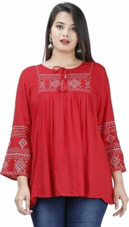 Checkout this latest Tops & Tunics
Product Name: *Fancy Glamorous Women Tops & Tunics*
Fabric: Rayon
Sleeve Length: Three-Quarter Sleeves
Pattern: Embroidered
Multipack: 1
Sizes:
S, M, L (Bust Size: 40 in, Length Size: 32 in) 
XL, XXL, XXXL
Country of Origin: India
Easy Returns Available In Case Of Any Issue


Catalog Rating: ★4.4 (68)

Catalog Name: Comfy Ravishing Women Tops & Tunics
CatalogID_6134053
C79-SC1020
Code: 292-26697503-999