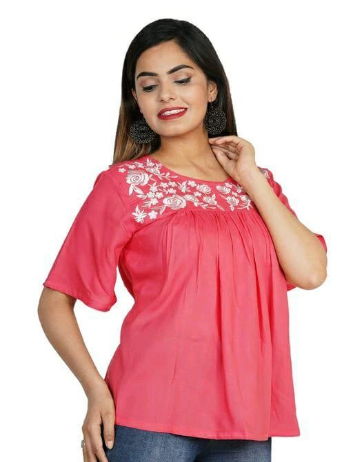 Checkout this latest Tops & Tunics
Product Name: *Fancy Women Tops & Tunics*
Fabric: Rayon
Sleeve Length: Short Sleeves
Pattern: Embroidered
Multipack: 1
Sizes:
S (Bust Size: 18 in) 
M, L, XL, XXL, XXXL
Country of Origin: India
Easy Returns Available In Case Of Any Issue


Catalog Rating: ★4.1 (78)

Catalog Name: Fancy Women Tops & Tunics
CatalogID_8128940
C79-SC1020
Code: 992-33887724-992