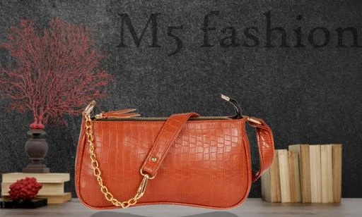 Checkout this latest Cross Body Bags & Sling Bags
Product Name: *Ravishing Stylish Women Slingbags*
Material: Faux Leather/Leatherette
No. of Compartments: 2
Pattern: Self Design
Net Quantity (N): 1
Sizes:Free Size (Length Size: 11 in, Width Size: 3 in, Height Size: 5 in) 
This bag is classy, subtle and spacious made of quality materials that allows you to stuff all your essentials with ease,Product in the details, define new elegance made of selected high quality material with soft smooth texture fine workmanship of the handles for comfortable hand feeling fringe tassels & drawstring design for extra chic appearance
Country of Origin: India
Easy Returns Available In Case Of Any Issue


SKU: M5 SB031 TAN
Supplier Name: M5 FASHION

Code: 924-35180701-9971

Catalog Name: Voguish Versatile Women Slingbags
CatalogID_8436791
M09-C27-SC5090
