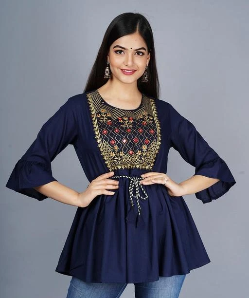 Checkout this latest Tops & Tunics
Product Name: *Stylish Elegant Women Tops & Tunics*
Fabric: Rayon
Sleeve Length: Three-Quarter Sleeves
Pattern: Embroidered
Multipack: 1
Sizes:
S (Bust Size: 36 in, Length Size: 28 in) 
M (Bust Size: 38 in, Length Size: 28 in) 
Country of Origin: India
Easy Returns Available In Case Of Any Issue


Catalog Rating: ★4.1 (374)

Catalog Name: Stylish Elegant Women Tops & Tunics
CatalogID_9429806
C79-SC1020
Code: 972-39319734-999