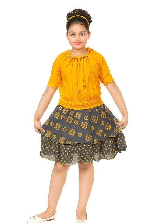 Checkout this latest Clothing Set
Product Name: *Modern Fancy Girls Top & Bottom Sets*
Top Fabric: Rayon
Bottom Fabric: Rayon
Sleeve Length: Three-Quarter Sleeves
Top Pattern: Self-Design
Bottom Pattern: Printed
Net Quantity (N): Single
Add-Ons: No Add Ons
Sizes:
4-5 Years (Top Chest Size: 28 in, Top Length Size: 21 in, Bottom Waist Size: 28 in, Bottom Length Size: 21 in) 
5-6 Years (Top Chest Size: 29 in, Top Length Size: 21 in, Bottom Waist Size: 29 in, Bottom Length Size: 21 in) 
6-7 Years (Top Chest Size: 30 in, Top Length Size: 22 in, Bottom Waist Size: 30 in, Bottom Length Size: 22 in) 
7-8 Years (Top Chest Size: 31 in, Top Length Size: 22 in, Bottom Waist Size: 31 in, Bottom Length Size: 22 in) 
8-9 Years (Top Chest Size: 32 in, Top Length Size: 23 in, Bottom Waist Size: 32 in, Bottom Length Size: 23 in) 
9-10 Years (Top Chest Size: 33 in, Top Length Size: 23 in, Bottom Waist Size: 33 in, Bottom Length Size: 23 in) 
ANG Fashion strives to bring the best possible fashion for your cute princess, the target customer base is the 4-10 years old girls. ANG Fashion believes that each girl is a princess and needs to be treated with care. So, choosing ANG Fashion dress will be the most important gift for them. Transforming your cute girls into a princess, ANG Fashion dresses are made with utmost care for your baby. The little girls dress is soft and breathable, making your little girls so cute and adorable, like a real princess. Perfect for the Wedding, Party, Holiday, Birthday, Dancing, Prom and other Formal Occasions, As well as the New Seasons, a great gift for lovely girls!
Country of Origin: India
Easy Returns Available In Case Of Any Issue


SKU: Yellow with Grey Printed Top Skirt 
Supplier Name: OM SAI KIDSWORLD

Code: 114-40191012-999

Catalog Name: Pretty Stylish Girls Top & Bottom Sets
CatalogID_9640937
M10-C32-SC1147