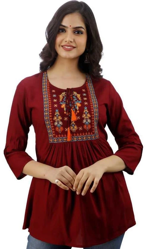 Checkout this latest Tops & Tunics
Product Name: *WomanCare Embroidered Tops*
Fabric: Rayon
Sleeve Length: Three-Quarter Sleeves
Pattern: Embroidered
Net Quantity (N): 1
Sizes:
S (Bust Size: 36 in, Length Size: 28 in) 
M (Bust Size: 38 in, Length Size: 28 in) 
L (Bust Size: 40 in, Length Size: 28 in) 
XL (Bust Size: 42 in, Length Size: 28 in) 
XXL (Bust Size: 44 in, Length Size: 28 in) 
 Tops
Country of Origin: India
Easy Returns Available In Case Of Any Issue


SKU: CN-125-MAROON
Supplier Name: M/S SHIV SHAKTI

Code: 203-40915661-999

Catalog Name: Trendy Retro Women Tops & Tunics
CatalogID_9829243
M04-C07-SC1020