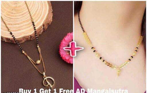 Checkout this latest Mangalsutras
Product Name: *D Letter Alphabet Letter Locket Mangalsutra With Free Gift Kidiya Mangalsutra For Women's*
Base Metal: Alloy
Plating: Gold Plated
Stone Type: Cubic Zirconia/American Diamond
Sizing: Non-Adjustable
Type: Single Strand Mangalsutra
Net Quantity (N): 2
Sizes:Free Size (Length Size: 18 in) 
Vesture Knot
Anniversary/ Valentine Women;s Gift Mangalsutra, Dokiya, Kidiya in Gold Polish. Mangalsutra has 18'' inch Single line Black & Gold beads mala. This Combo set high end fashion design which has elegance and style that will add radiance to the natural beauty of women. Special made for Happy Couple. Also You get One Free Mangalsutra.
Buy 1 Get 1 Free.
Size: 18 inch.
Package includes: 2 pieces of mangalsutra.
Country of Origin: India
Easy Returns Available In Case Of Any Issue


SKU: IMJ1-D+M252-48
Supplier Name: VestureKnot

Code: 051-41861629-942

Catalog Name: Twinkling Fusion Mangalsutras
CatalogID_10093710
M05-C11-SC1097