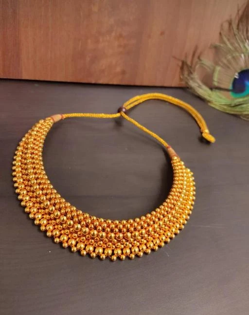 Checkout this latest Necklace
Product Name: *Allure Glittering necklaces*
Base Metal: Brass & Copper
Plating: Gold Plated
Stone Type: Artificial Stones & Beads
Sizing: Adjustable
Type: As Per Image
Multipack: 1
Traditional Wedding Ethnic Maharashtrian Thushi Necklace Set Kolhapuri Saaj Gold Plated Thushi ( Choker ) Necklace Jewellery Set for Women and Girls Pearl Ethnic Jewellery Broad Heavy Marathi Maharashtrian Jewellery Kolhapuri Saaj Thushi Mangalsutra Pendant Locket Mala chains Choker Chinchpeti Moti Necklace for Women Girl Stylish fancy party wear Set Simple 22K Gold Plated Micro 1 One Gram gold Jewellery Beads Design Jewelry Big Vati Mangal Sutra Sets Girls Golden Chain High Long Micron Polish Maharashtrian Traditional Kolhapuri Patta Thushi Maharashtrian jewellery Designs Ruby, Cubic Zirconia, Diamond Gold-plated Plated Copper, Brass, Metal, Crystal, Alloy Necklace
Country of Origin: India
Easy Returns Available In Case Of Any Issue


Catalog Rating: ★4 (306)

Catalog Name: Allure Glittering necklaces
CatalogID_10246032
C77-SC1092
Code: 612-42382984-995