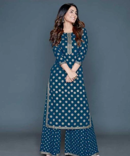 Checkout this latest Kurta Sets
Product Name: *Hina Khan Rayon Printed Kurta and Palazzo Set (Blue)*
Top Fabric: Rayon
Bottom Fabric: Rayon
Scarf Fabric: No Scarf
Sleeve Length: Three-Quarter Sleeves
Bottom Type: Straight Pajama
Stitch Type: Stitched
Pattern: Printed
Sizes:
M (Top Length Size: 47 in, Bottom Waist Size: 28 in, Bottom Length Size: 42 in) 
L, XL, XXL, XXXL
KGN 121 explores the collection of beautifully designed Kurti with Plazzo Set. Each piece is elegantly crafted and will surely add to your wardrobe.
Country of Origin: India
Easy Returns Available In Case Of Any Issue


SKU: 87560639
Supplier Name: KGN 121

Code: 163-42396985-9911

Catalog Name: unique women kurta sets
CatalogID_10249948
M06-C18-SC1201