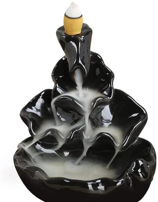 Checkout this latest Showpieces & Collectibles
Product Name: *Arohi Enterprises Backflow Smoke Fountain Incense Holder Showpiece Figurine with Free 10 Backflow Incense Sticks Cones - (11 cm X 11 cm)*
Material: Resin
Type: Figurines
Size: Standard
Net Quantity (N): 1
Product Length: 10 cm
Product Height: 10 cm
Product Breadth: 11 cm
Package Contents: 1 Backflow Smoke Fountain Incense Holder With 10 Free Incense cones
Size: Approx. 10 * 10* 11cm(L * W * H)
Back-flow incense burner creates an illusion of a Smokey waterfall
Normally place an incense cone at the top of the waterfall and with the cone’s special properties, the smoke starts to flow in reverse direction, that is from top to bottom and in turn creates a beautiful Smokey waterfall;
Please not that smoke normally not backflow as the picture show if ordinary incense is lit, but can be backflow if backflow incense used. Besides, please incense in a closed environment without wind.
This backflow smoke fountain is also suitable for temple , office cabin, boss desk, pooja ghar
Perfect piece of home decor items for living room , bedroom, hall decorative showpiece of backflow smoke fountain
Country of Origin: India
Easy Returns Available In Case Of Any Issue


SKU: AEIncenseHolderSmokeFountain
Supplier Name: Arohi Enterprises

Code: 512-42784541-994

Catalog Name: Elegant Showpieces & Collectibles
CatalogID_10360220
M08-C25-SC2485