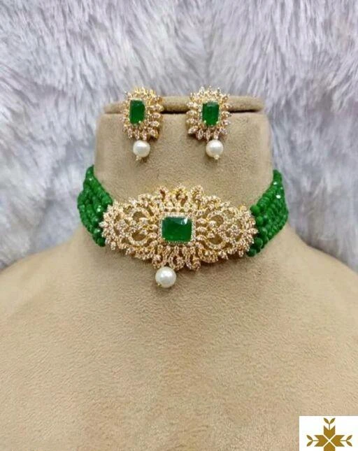 Checkout this latest Jewellery Set
Product Name: *Twinkling Chunky Jewellery Sets*
Base Metal: Brass
Plating: Gold Plated
Stone Type: Cubic Zirconia/American Diamond
Sizing: Adjustable
Type: Choker and Earrings
Multipack: 1
Country of Origin: India
Easy Returns Available In Case Of Any Issue


SKU: Green lambi 
Supplier Name: PUSHPA ENTERPRISES

Code: 433-43269407-204

Catalog Name: Feminine Chic Jewellery Sets
CatalogID_10503478
M05-C11-SC1093