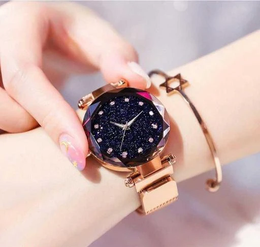Checkout this latest Analog Watches
Product Name: *Classy Women Gold Metal Analog Watch*
Strap Material: Metal
Date Display: No
Dial Color: Black
Dial Design: Ethnic
Dial Shape: Round
Dual Time: No
Gps: No
Light: No
Scratch Resistant: No
Shock Resistance: No
Water Resistance: No
Net Quantity (N): 1
Fancy Designer Rose Gold Color Magnetic Strap with Black Stylish Diamond Studded Dial Quartz Movement New Arrival Best Designer Hot Selling Top Trending Unique Festive style watch for Women’s watch for girl's watch for womens watch for girls watch for watch for women watches womens watches girls girls watch 2021 stylish watch for women style womens watch trending ladies watches girls style magnet watch for girls casual ghadi Analog Watch - For Women
Sizes: 
Free Size (Dial Diameter Size: 34 mm) 
Country of Origin: India
Easy Returns Available In Case Of Any Issue


SKU: MGNT_12_GOLD
Supplier Name: Vrakish

Code: 491-44463009-993

Catalog Name: Classy Women Watches
CatalogID_10844675
M05-C13-SC1087