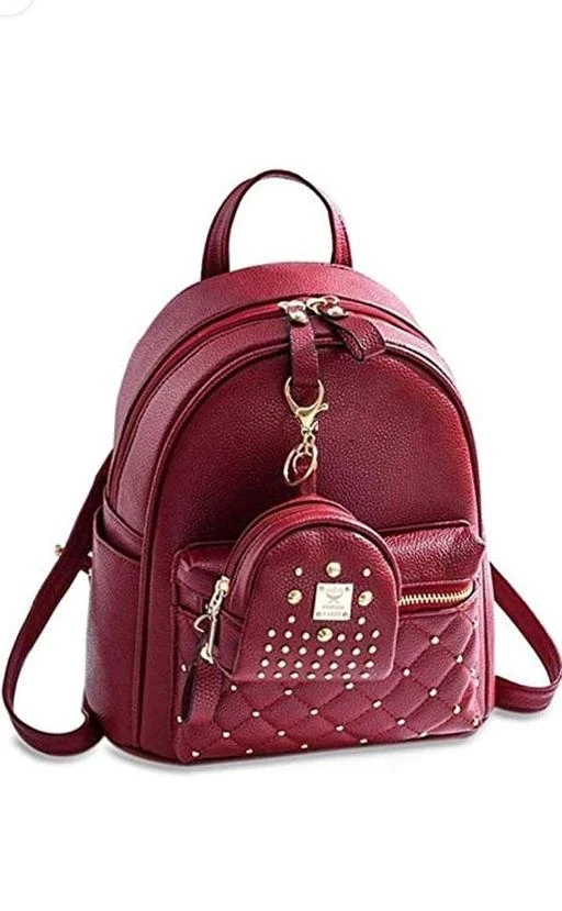 Checkout this latest Backpacks
Product Name: *Trendy Stylish Women Backpacks*
Material: PU
No. of Compartments: 1
Pattern: Solid
Multipack: 1
Sizes:
Free Size (Length Size: 14 in, Width Size: 13 in) 
Country of Origin: India
Easy Returns Available In Case Of Any Issue


Catalog Rating: ★3.9 (61)

Catalog Name: Elegant Fancy Women Backpacks
CatalogID_11672835
C73-SC1074
Code: 572-47274644-9991