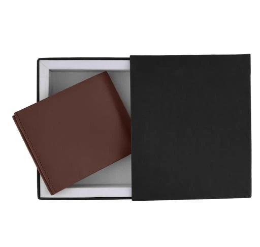 Checkout this latest Wallets
Product Name: *FancyUnique Men Wallets*
Material: Leather
No. of Compartments: 5
Pattern: Solid
Multipack: 1
Sizes: Free Size (Length Size: 10 cm, Width Size: 12 cm) 
Country of Origin: India
Easy Returns Available In Case Of Any Issue


SKU: 404TN
Supplier Name: S S LEATHER ART

Code: 524-47483520-009

Catalog Name: FancyUnique Men Wallets
CatalogID_11736784
M05-C12-SC1221
