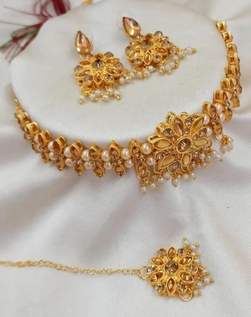 Checkout this latest Jewellery Set
Product Name: *118 CHOKAR SET  FULL L C T *
Base Metal: Alloy
Plating: Gold Plated - Matte
Stone Type: Pearls
Sizing: Adjustable
Type: Choker and Earrings
Net Quantity (N): 1
This gorgeous necklace is crafted with utmost care to personify your ethnic beauty. From tiniest details to pitch perfect colors, we bring you the finest collection. Wear this piece of art in weddings, parties and celebrations and embrace its beauty, because you deserve to look like a queen.
Country of Origin: India
Easy Returns Available In Case Of Any Issue


SKU: 118  CHOKAR SET  FULL L C T
Supplier Name: Crystal Bangles

Code: 571-47567814-999

Catalog Name: Twinkling Beautiful Jewellery Sets
CatalogID_11761982
M05-C11-SC1093
.