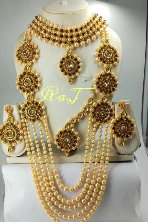 Checkout this latest Jewellery Set
Product Name: *Elite Elegant Jewellery Sets*
Base Metal: Alloy
Plating: Gold Plated
Stone Type: Artificial Stones & Beads
Type: Full Bridal Set
Multipack: 1
Country of Origin: India
Easy Returns Available In Case Of Any Issue


Catalog Rating: ★4.1 (298)

Catalog Name: Elite Elegant Jewellery Sets
CatalogID_11969405
C77-SC1093
Code: 823-48246852-995