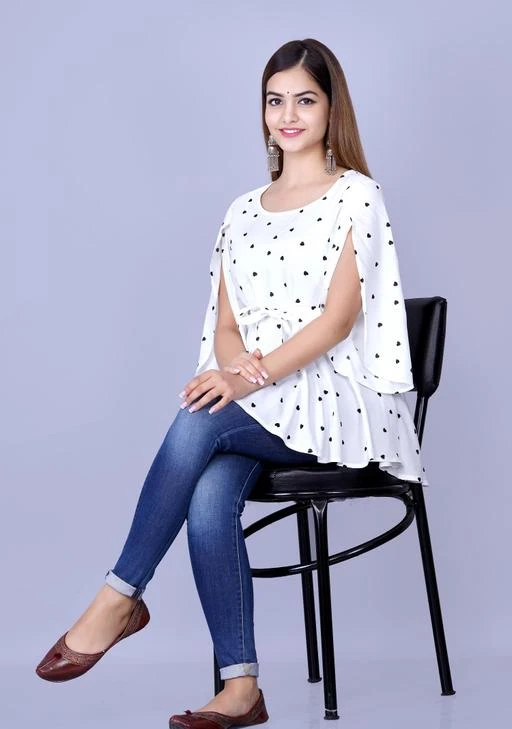 Checkout this latest Tops & Tunics
Product Name: * Classy Latest Women Tops & Tunics*
Fabric: Rayon
Sleeve Length: Three-Quarter Sleeves
Pattern: Printed
Multipack: 1
Sizes:
XL (Bust Size: 42 in, Length Size: 28 in) 
Country of Origin: India
Easy Returns Available In Case Of Any Issue


Catalog Rating: ★3.4 (5)

Catalog Name: Classy Latest Women Tops & Tunics
CatalogID_12000904
C79-SC1020
Code: 633-48352890-999