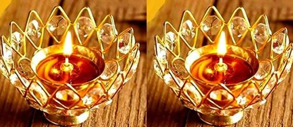 Checkout this latest Festive Diyas
Product Name: *Attractive Festive Diyas*
Net Quantity (N): Pack of 2
brass This decorative item gives your Home an Unique appeal with our ornate golden Crystal Diya. Gold finished provides a Attractive Look and best item to Gift Does not get hot even after long hours of repeated burning Is designed to allow easy cleaning and refilling of oil Is safer than an open flamed diya and can be used even when the fan is on  Crystal Diya from premium quality material, this Diya are safe to use. With a unique design, these Diya will change the décor of your room and make it appear lovely. Apt for this festive season, let this Diya beautify your surroundings in no time. Illuminate your room with this Diya and it is sure to catch the attention of the onlookers at once. You can even gift this wonderful Diya to your loved ones.
Country of Origin: India
Easy Returns Available In Case Of Any Issue


SKU: Metal Yellow Brass Crystal Round Small KamalDeep / Jyoti Oil Lamp / Lotus Diya for Home Mandir Pooja Decor Crystal Diya Set of 2 pcs
Supplier Name: SAI_COLLECTION

Code: 552-48461252-995

Catalog Name: Attractive Festive Diyas
CatalogID_12034786
M08-C25-SC1604
