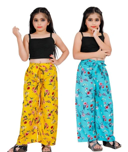 Checkout this latest Pants
Product Name: *Manaitri Girl's Regular fit Crepe Combo Plazzo*
Fabric: Crepe
Pattern: Printed
Multipack: 2
Sizes: 
5-6 Years (Waist Size: 25 in, Hip Size: 29 in, Length Size: 23 in) 
6-7 Years (Waist Size: 25 in, Hip Size: 29 in, Length Size: 23 in) 
14-15 Years (Waist Size: 31 in, Hip Size: 40 in, Length Size: 40 in) 
15-16 Years (Waist Size: 31 in, Hip Size: 40 in, Length Size: 40 in) 
Country of Origin: India
Easy Returns Available In Case Of Any Issue


Catalog Rating: ★4 (140)

Catalog Name: Tinkle Classy Girls Pants
CatalogID_12068509
C0-SC1148
Code: 214-48567749-9941