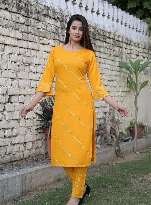 Checkout this latest Kurta Sets
Product Name: *Women's Striped Yellow Rayon Kurta Set with Pants*
Kurta Fabric: Rayon
Bottomwear Fabric: Rayon
Fabric: Rayon
Sleeve Length: Three-Quarter Sleeves
Set Type: Kurta With Bottomwear
Bottom Type: Pants
Pattern: Striped
Net Quantity (N): Single
Sizes:
M (Bust Size: 38 in, Kurta Length Size: 45 in, Bottom Waist Size: 30 in, Bottom Length Size: 38 in) 
L (Bust Size: 40 in, Kurta Length Size: 45 in, Bottom Waist Size: 32 in, Bottom Length Size: 38 in) 
XL (Bust Size: 42 in, Kurta Length Size: 45 in, Bottom Waist Size: 34 in, Bottom Length Size: 38 in) 
XXL (Bust Size: 44 in, Kurta Length Size: 45 in, Bottom Waist Size: 36 in, Bottom Length Size: 38 in) 
Easy Returns Available In Case Of Any Issue


SKU: Shiv_GP_New_YLW_001
Supplier Name: SHIVANSH ENTER#

Code: 173-4901412-6501

Catalog Name: Women's Striped Rayon Kurta Set with Pants
CatalogID_716918
M03-C04-SC1003