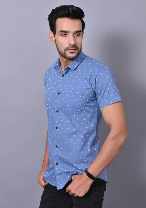 Checkout this latest Shirts
Product Name: *Pretty Fashionable Men Shirts*
Fabric: Cotton
Sleeve Length: Short Sleeves
Pattern: Printed
Multipack: 1
Sizes:
M (Chest Size: 38 in, Length Size: 27.5 in) 
L (Chest Size: 40 in, Length Size: 28.5 in) 
XL (Chest Size: 42 in, Length Size: 29 in) 
XXL (Chest Size: 44 in, Length Size: 29.5 in) 
Country of Origin: India
Easy Returns Available In Case Of Any Issue


SKU: IJpBnTbG
Supplier Name: AGWAN FASHION

Code: 024-50276850-9911

Catalog Name: Pretty Ravishing Men Shirts
CatalogID_12582791
M06-C14-SC1206