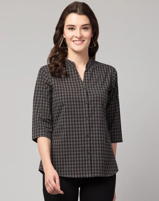 Checkout this latest Shirts
Product Name: *Trendy Sensational Women shirt*
Fabric: Cotton
Sleeve Length: Three-Quarter Sleeves
Pattern: Checked
Net Quantity (N): 1
Sizes:
XS, S, M, L, XL, XXL
Get your fusion game on fleek with Hive91 short tunic collection, this short tunic is easy to wear and extremely comfortable. This Short Tunics flatter every body type, This piece has a thoughtful touch to our simple design. with a raised  Mandarin Collar and 3/4 length sleeves, it comes in an easy shape, hip length. Throw it on over leggings for an easy weekend style. Approx Length for Size SMALL: 26 Inches
Country of Origin: India
Easy Returns Available In Case Of Any Issue


SKU: RH694STUGY
Supplier Name: RIPP IMP

Code: 463-50383718-2901

Catalog Name: Hive91 Sensational Women shirt
CatalogID_11272934
M04-C07-SC1022