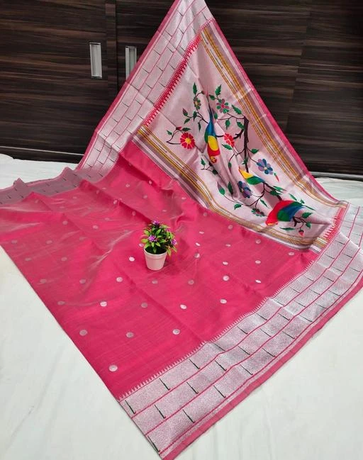 Checkout this latest Sarees
Product Name: *Parrot Brocade Semi Pure Paithani Saree*
Saree Fabric: Litchi Silk
Blouse: Separate Blouse Piece
Blouse Fabric: Litchi Silk
Pattern: Zari Woven
Net Quantity (N): Single
Don a paithani saree to have stupendous delight in your appearance. This paithani saree is a stunning creation that will garnish you with marvelous elegance. The soft silk paithani saree is crafted with a sparkling shade of  has its beauty boosted with all the zari artistry on it. The border and pallu are worked with zari strands and marvelous motifs of parrot intensifying the delicacy of this traditional silk paithani saree
Sizes: 
Free Size (Saree Length Size: 5.5 m, Blouse Length Size: 0.8 m) 
Country of Origin: India
Easy Returns Available In Case Of Any Issue


SKU: MIP_NANDINI_PEACH
Supplier Name: MANGROLIYA NX

Code: 996-50625535-999

Catalog Name: Alisha Refined Sarees
CatalogID_12687564
M03-C02-SC1004