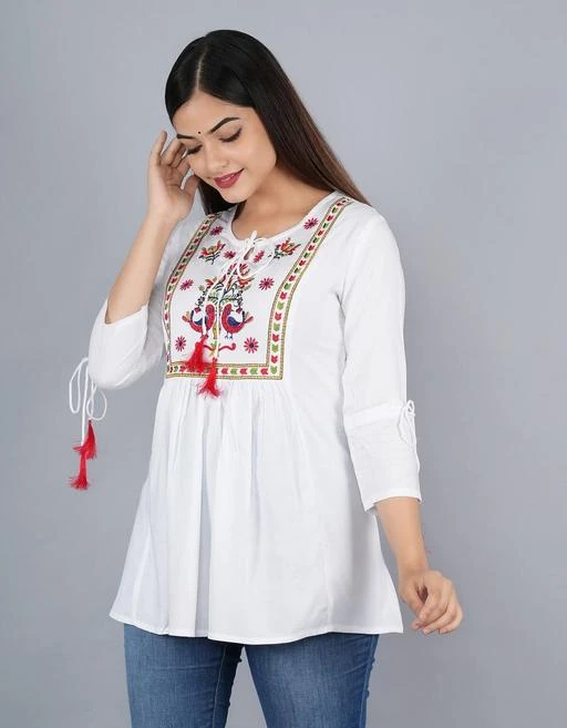 Checkout this latest Tops & Tunics
Product Name: *womens embroidery partwear and festival top*
Fabric: Rayon
Sleeve Length: Three-Quarter Sleeves
Pattern: Embroidered
Multipack: 1
Sizes:
S (Bust Size: 36 in, Length Size: 28 in) 
M (Bust Size: 38 in, Length Size: 28 in) 
L (Bust Size: 40 in, Length Size: 28 in) 
XL (Bust Size: 42 in, Length Size: 28 in) 
XXL (Bust Size: 44 in, Length Size: 28 in) 
Country of Origin: India
Easy Returns Available In Case Of Any Issue


SKU: ASHLEE-018WHITE
Supplier Name: VAASHI FASHION

Code: 373-50743942-9911

Catalog Name: Fancy Designer Women Tops & Tunics
CatalogID_12724840
M04-C07-SC1020