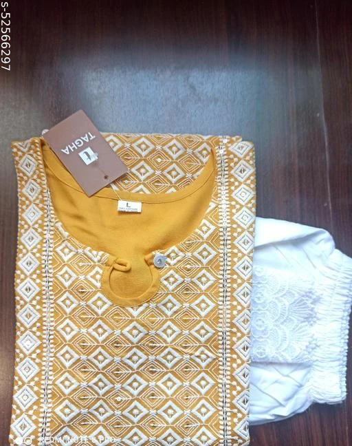 Checkout this latest Kurta Sets
Product Name: *Yellow color rayon embroidred Kurta pant set*
Kurta Fabric: Rayon
Bottomwear Fabric: Rayon
Fabric: Rayon
Set Type: Kurta With Bottomwear
Bottom Type: Pants
Pattern: Embroidered
Multipack: Pack Of 2
Sizes:
L (Bust Size: 40 in, Shoulder Size: 15 in, Kurta Waist Size: 36 in, Kurta Length Size: 48 in, Bottom Waist Size: 26 in, Bottom Hip Size: 47 in, Bottom Length Size: 39 in) 
Country of Origin: India
Easy Returns Available In Case Of Any Issue


Catalog Rating: ★4.1 (73)

Catalog Name: Kashvi Refined Women Kurta Sets
CatalogID_13286262
C74-SC1003
Code: 594-52566297-9991
