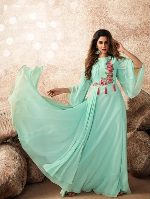 Checkout this latest Gowns
Product Name: *Trendy Glamorous Women Gowns*
Fabric: Georgette
Sleeve Length: Three-Quarter Sleeves
Pattern: Embroidered
Multipack: 1
Sizes:
M (Bust Size: 38 in, Length Size: 55 in, Waist Size: 36 in, Hip Size: 40 in) 
L (Bust Size: 40 in, Length Size: 55 in, Waist Size: 38 in, Hip Size: 42 in) 
XL (Bust Size: 42 in, Length Size: 55 in, Waist Size: 40 in, Hip Size: 44 in) 
XXL (Bust Size: 44 in, Length Size: 55 in, Waist Size: 42 in, Hip Size: 46 in) 
Country of Origin: INDIA
Easy Returns Available In Case Of Any Issue


Catalog Rating: ★4 (8)

Catalog Name: Trendy Glamorous Women Gowns
CatalogID_13346444
C79-SC1289
Code: 869-52755525-9941