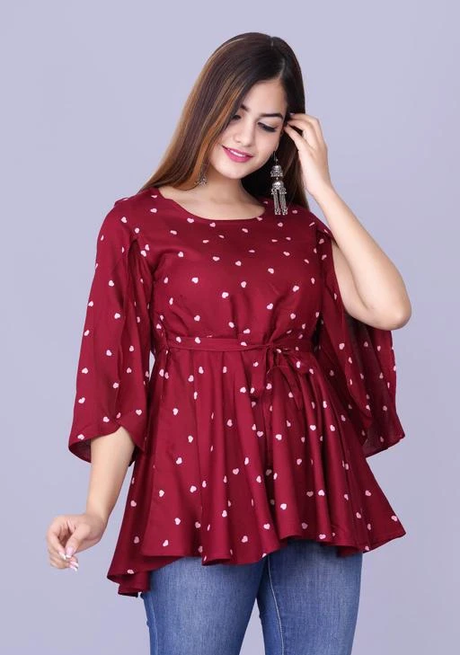 Checkout this latest Tops & Tunics
Product Name: *womens Rayon Printed top*
Fabric: Rayon
Sleeve Length: Three-Quarter Sleeves
Pattern: Printed
Multipack: 1
Sizes:
S (Bust Size: 36 in, Length Size: 28 in) 
M (Bust Size: 38 in, Length Size: 28 in) 
L (Bust Size: 40 in, Length Size: 28 in) 
XL (Bust Size: 42 in, Length Size: 28 in) 
XXL (Bust Size: 44 in, Length Size: 28 in) 
Country of Origin: India
Easy Returns Available In Case Of Any Issue


Catalog Rating: ★4 (99)

Catalog Name: Classic Glamorous Women Tops & Tunics
CatalogID_13583516
C79-SC1020
Code: 623-53490315-999