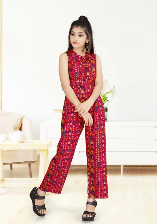 Checkout this latest Jumpsuits
Product Name: *Fashion Era Girl's Special Pure Rayon Silk Bandhni Printed Jumpsuit With Foil Prints With Very Beautiful Colours And pattern.*
Fabric: Rayon
Sleeve Length: Sleeveless
Pattern: Printed
Gender: Girls
Multipack: 1
Sizes: 
4-5 Years (Bust Size: 24 in, Waist Size: 22 in, Length Size: 29 in) 
5-6 Years (Bust Size: 24 in, Waist Size: 22 in, Length Size: 29 in) 
6-7 Years (Bust Size: 27 in, Waist Size: 25 in, Length Size: 33 in) 
8-9 Years (Bust Size: 29 in, Waist Size: 27 in, Length Size: 38 in) 
10-11 Years (Bust Size: 31 in, Waist Size: 29 in, Length Size: 41 in) 
12-13 Years (Bust Size: 33 in, Waist Size: 31 in, Length Size: 46 in) 
13-14 Years (Bust Size: 33 in, Waist Size: 31 in, Length Size: 46 in) 
Country of Origin: India
Easy Returns Available In Case Of Any Issue


Catalog Rating: ★4 (123)

Catalog Name: Modern Kids Jumpsuits
CatalogID_13689327
C62-SC1156
Code: 844-53809244-9921